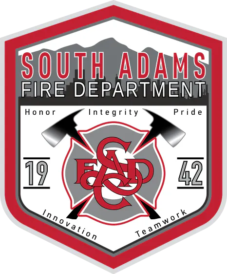 A badge logo for South Adams Fire Department with axes and values like Honor, Integrity, and Pride.