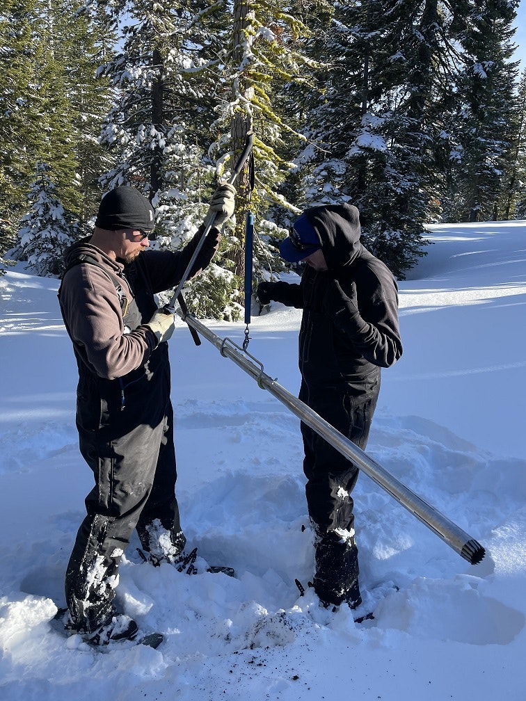 two people in the snow