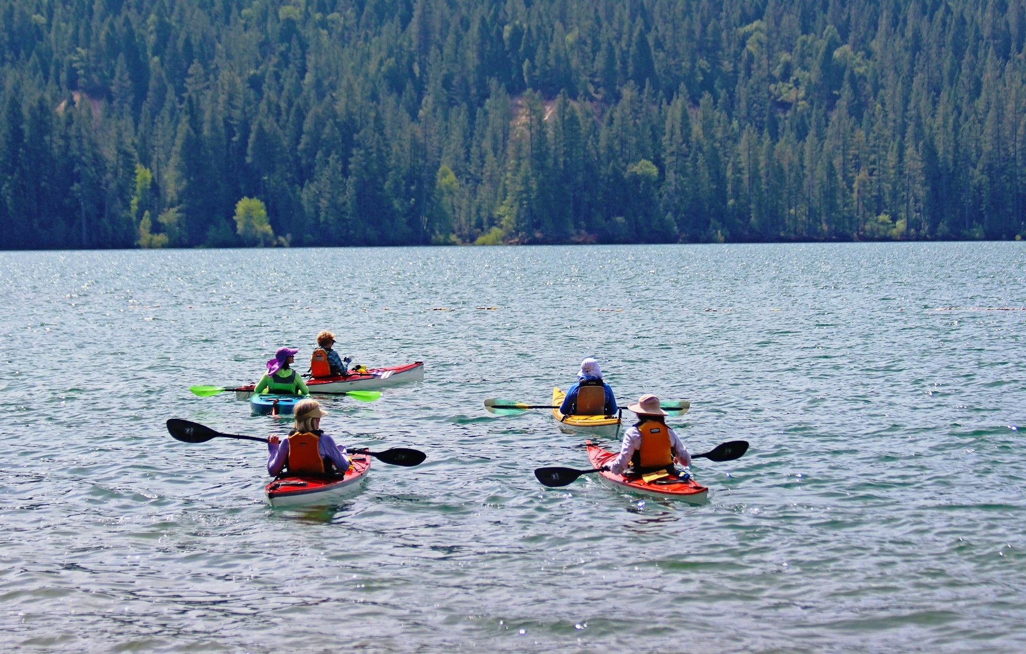 May contain: person, human, boat, vehicle, transportation, kayak, rowboat, and canoe