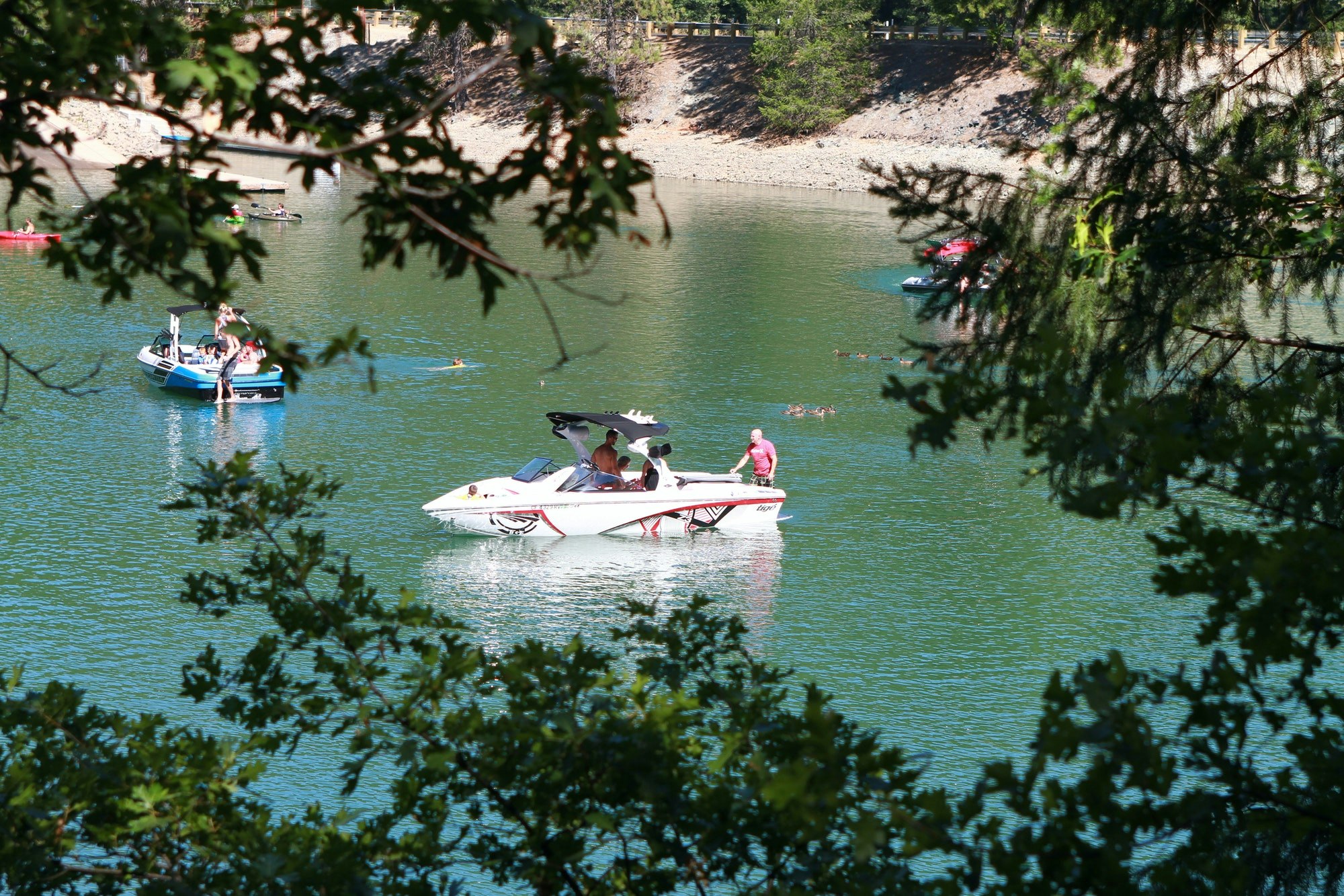 Boaters enjoying the day on Long Ravine on Rollins Lake.