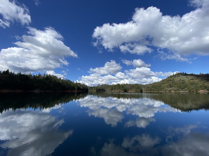 May contain: nature, water, outdoors, weather, cloud, sky, cumulus, and lake