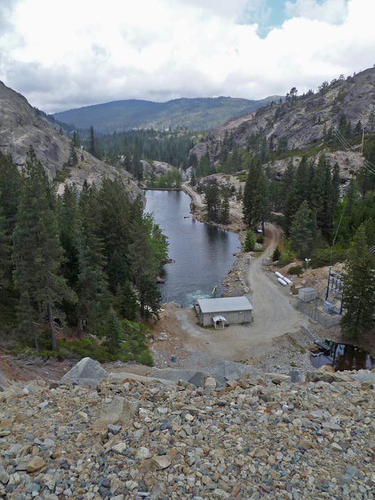 May contain: fir, tree, plant, gravel, road, wilderness, outdoors, nature, slate, rubble, building, and architecture