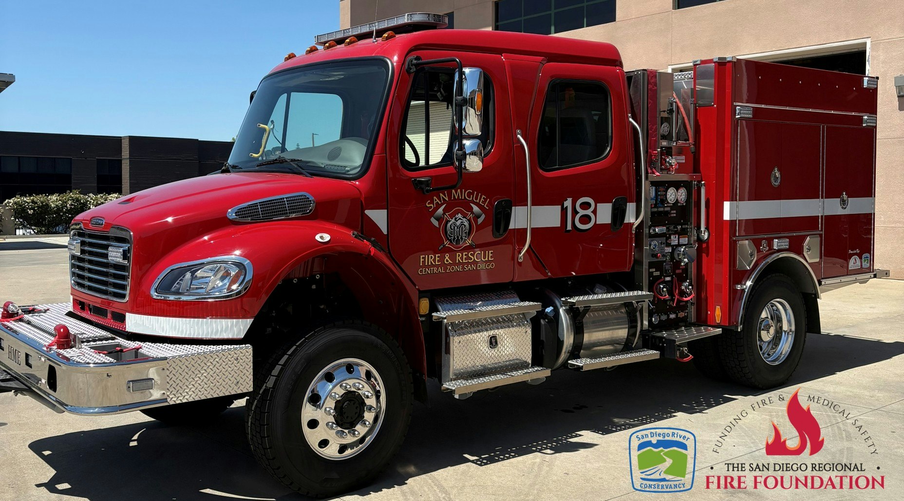 Red fire rescue truck from San Miguel Fire & Rescue, San Diego, with logos for The San Diego Regional Fire Foundation and Conservancy.