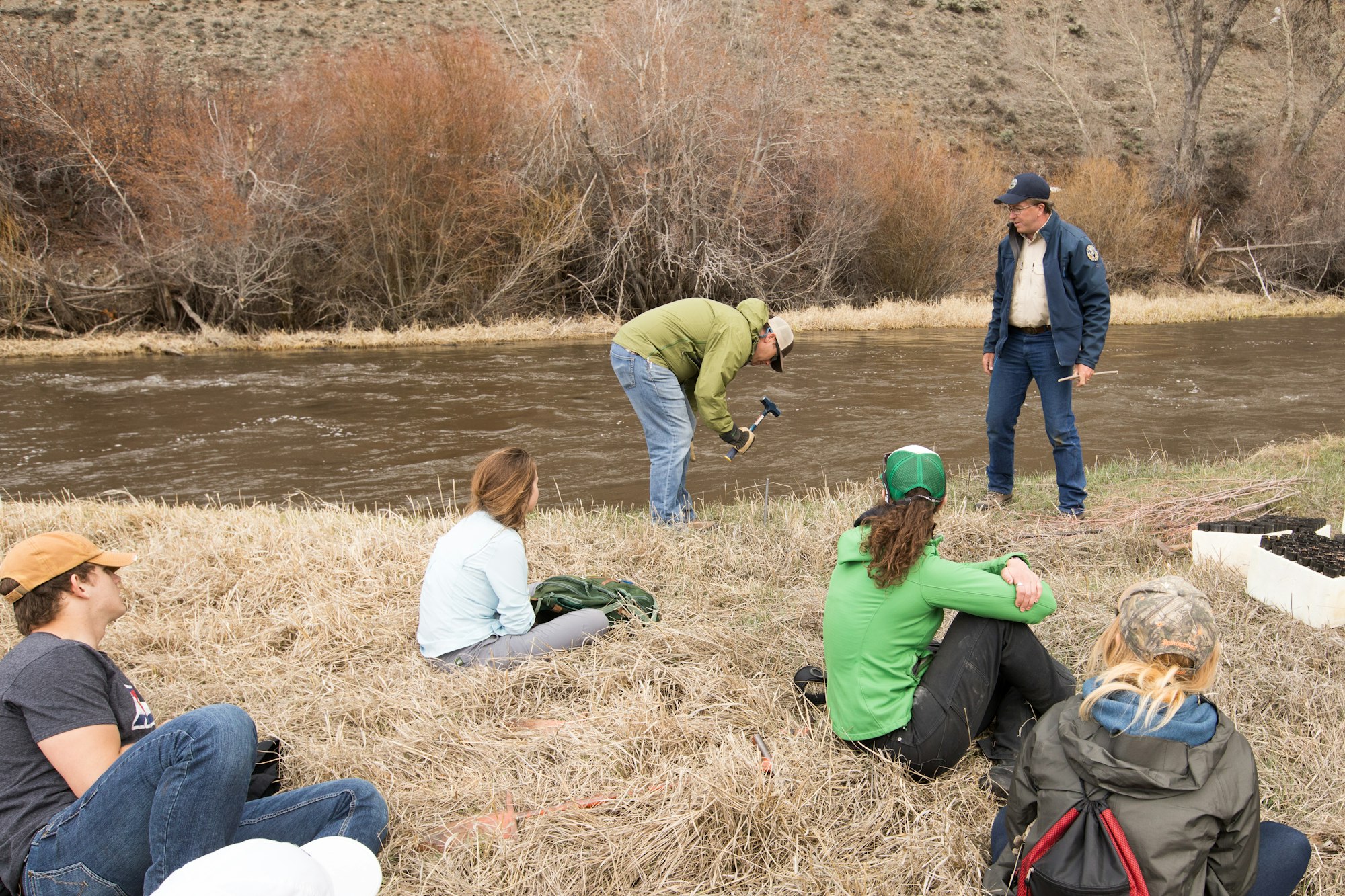 2019 workshop participants learn how to plant willow plugs