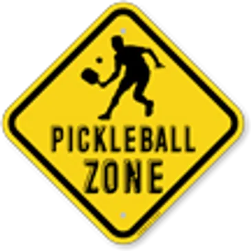 Yellow sign with a silhouette playing pickleball, labeled "PICKLEBALL ZONE".