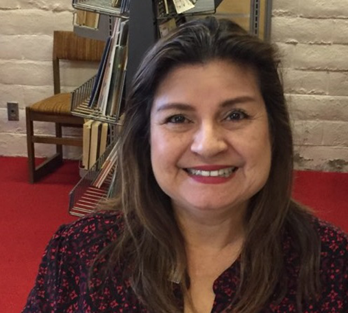 May contain: human, person, face, chair, furniture, and female