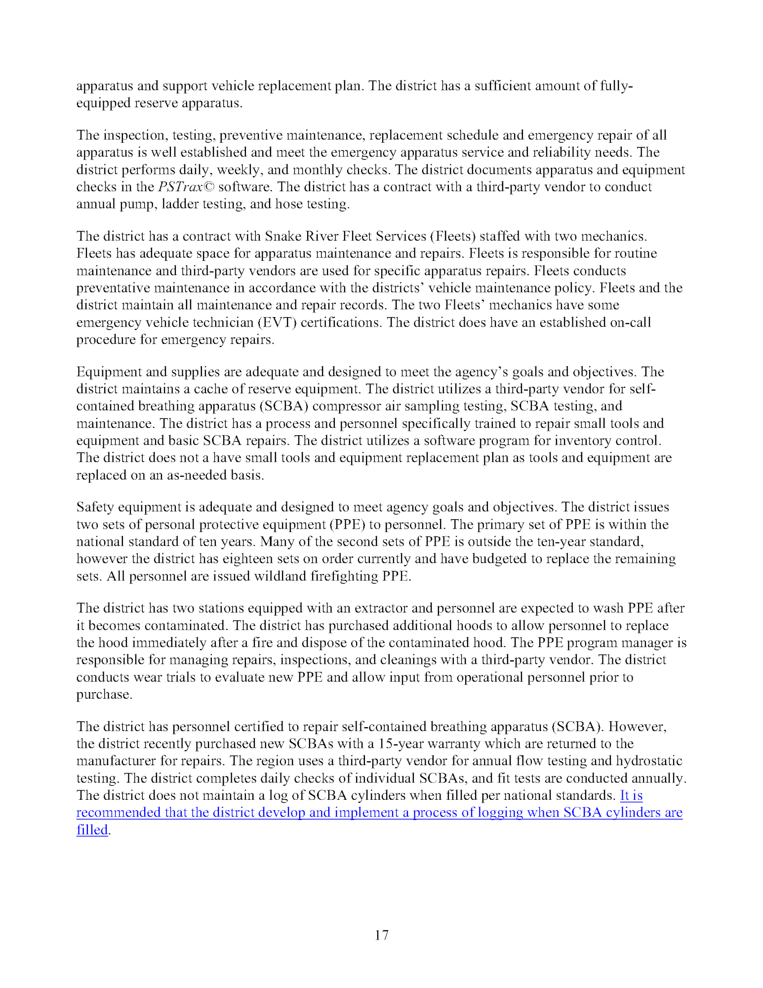 Text on an inspection report page highlighting apparatus maintenance, PPE, and SCBA management within a fire district.