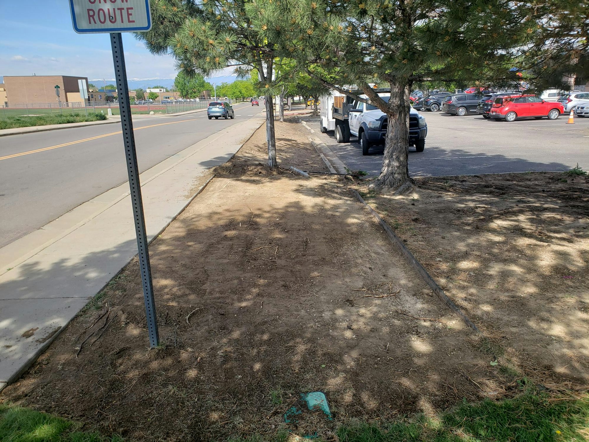 View of a landscape area that has been demoed to bare ground in anticipation for new plantings.