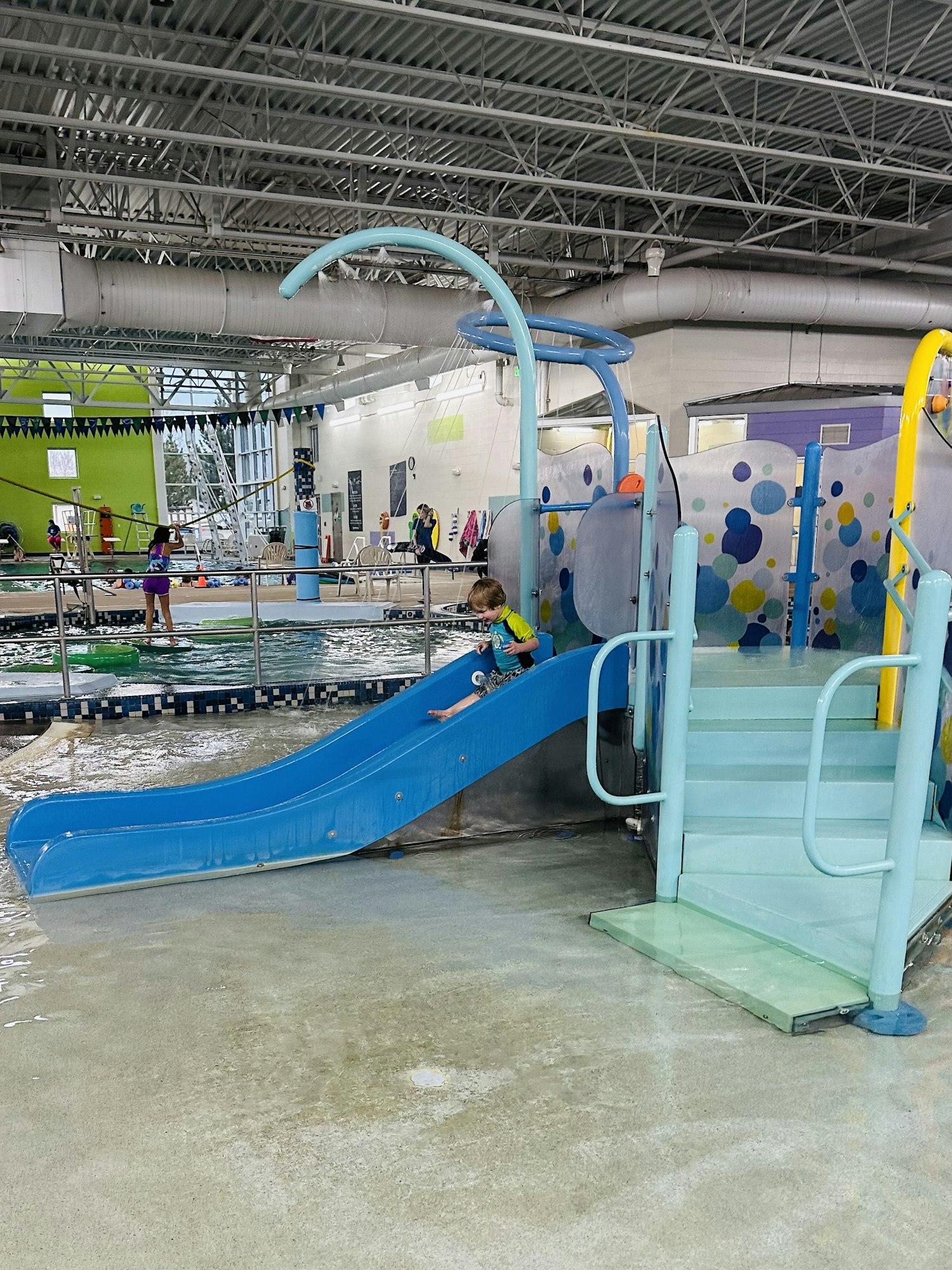 Kid on water slide