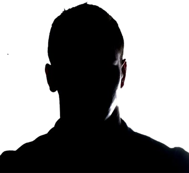 Silhouette of a person with an indistinct background.