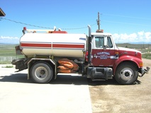 May contain: transportation, vehicle, trailer truck, truck, moving van, and van