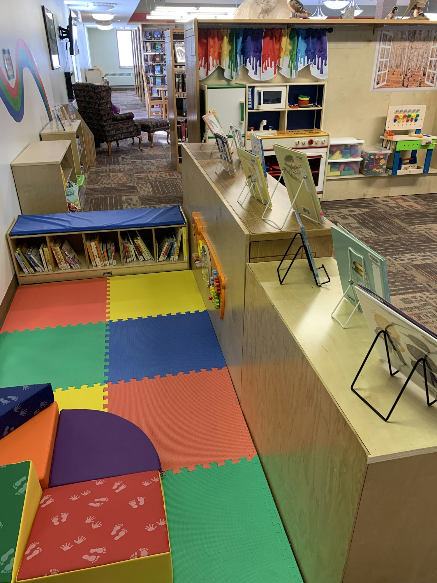 May contain: kindergarten, play area, chair, furniture, person, and indoors