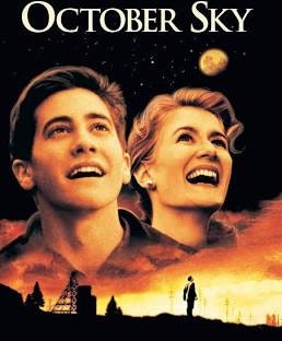 Cover of "October Sky" featuring a boy and girl looking upwards, with a night sky and crescent moon, industrial silhouettes below.