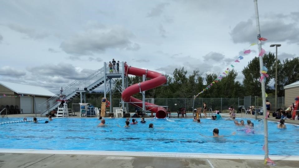 May contain: water, person, amusement park, and water park