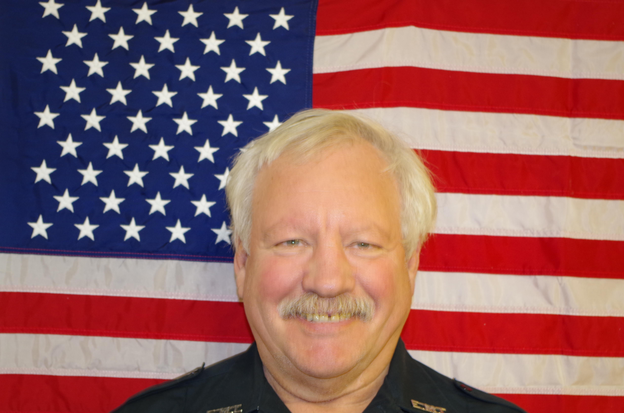 May contain: flag, symbol, person, human, and american flag