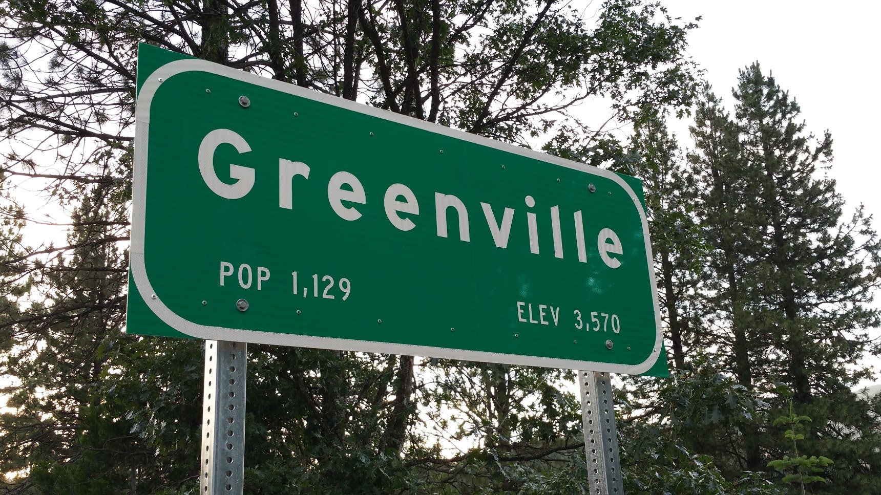 May contain: symbol, road sign, and sign