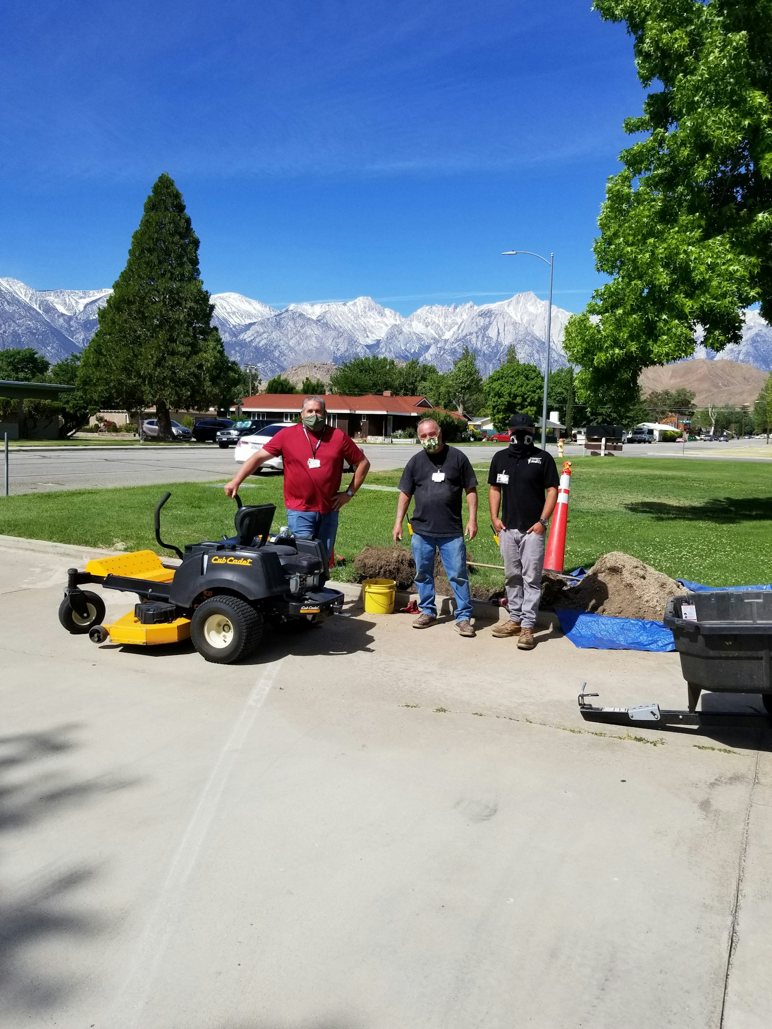 May contain: human, person, transportation, vehicle, kart, grass, and plant