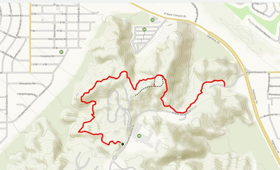 The image shows a mapped trail or hiking route highlighted in red, indicating contours and nearby roads.