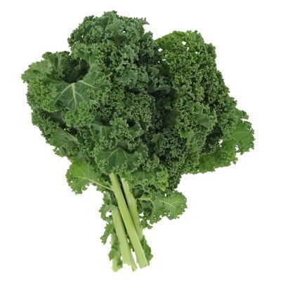 A bunch of fresh kale with curly green leaves.