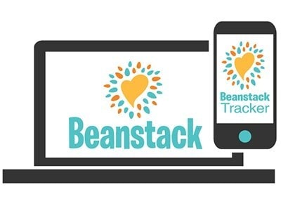 Laptop and smartphone with "Beanstack" logo, heart design, and "Beanstack Tracker" text.