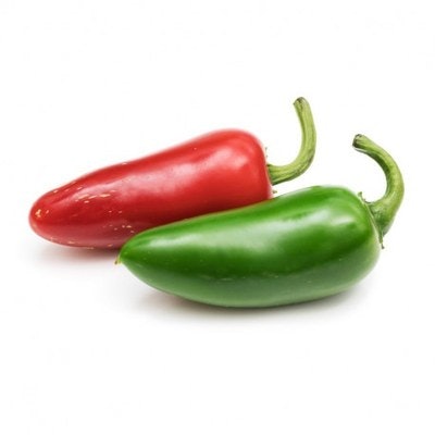 A red and a green pepper on a white background.