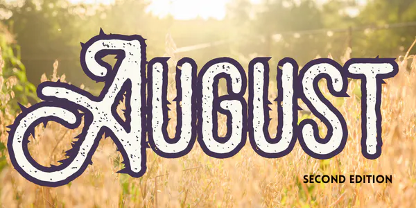 The image features the word "August" in a stylized font, along with "SECOND EDITION" against a backdrop of a sunlit field.