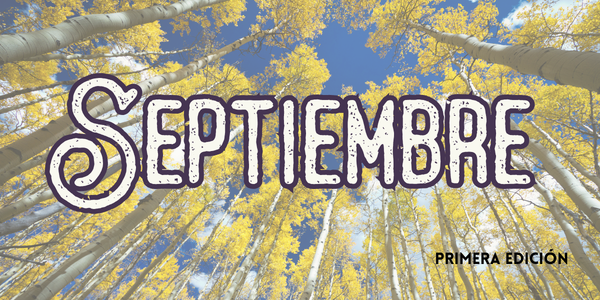 The image features tall trees with yellow leaves under a blue sky, with the word "Septiembre" prominently displayed.