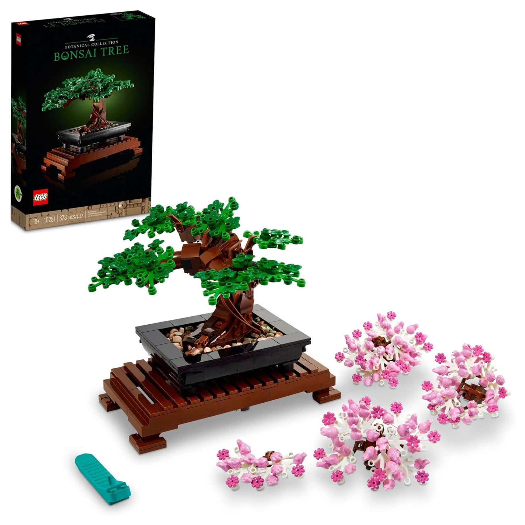LEGO Bonsai Tree set with green leaves and interchangeable pink cherry blossoms displayed on a wooden platform, box included.