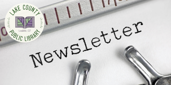 The image shows a close-up of a printed newsletter with a clip and a ruler, featuring the Lake County Public Library logo.