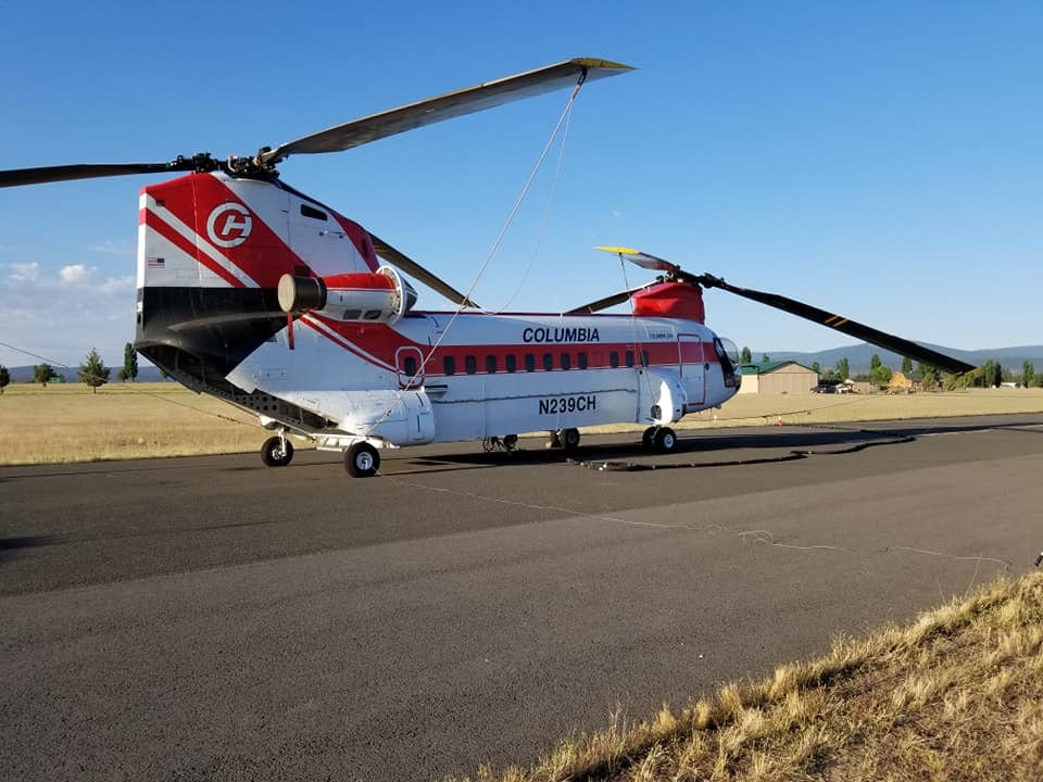May contain: transportation, helicopter, aircraft, vehicle, airport, and airfield