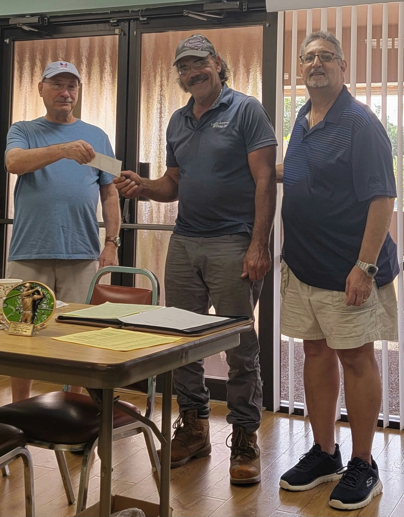 Fore Corners Golf Club President, Dennis Bader and Club Treasurer Jim Dunivant and, Dale from Creative Landscaping and Design, LLC