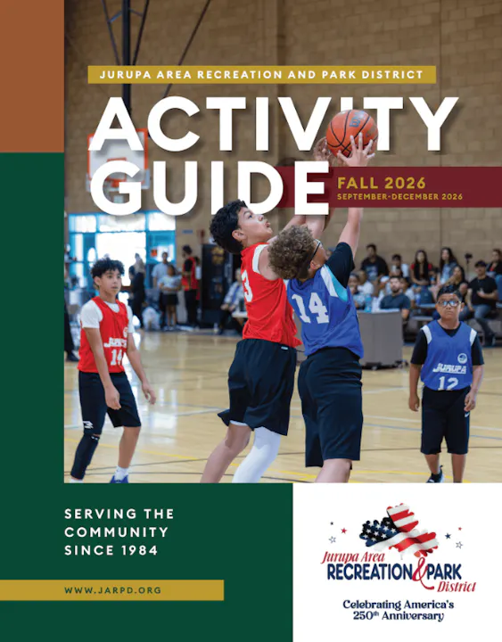 A cover for the Jurupa Area Recreation and Park District's activity guide for Fall 2026, featuring a youth basketball game.