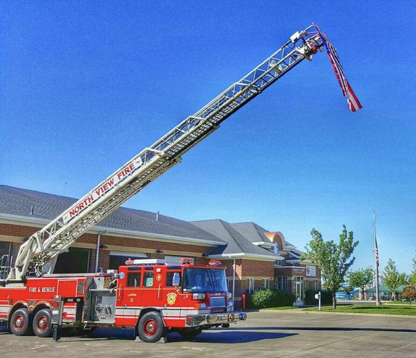 May contain: construction crane, truck, vehicle, transportation, and fire truck