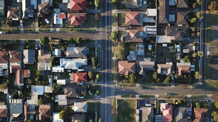 May contain: urban, neighborhood, building, nature, outdoors, landscape, scenery, road, suburb, and aerial view