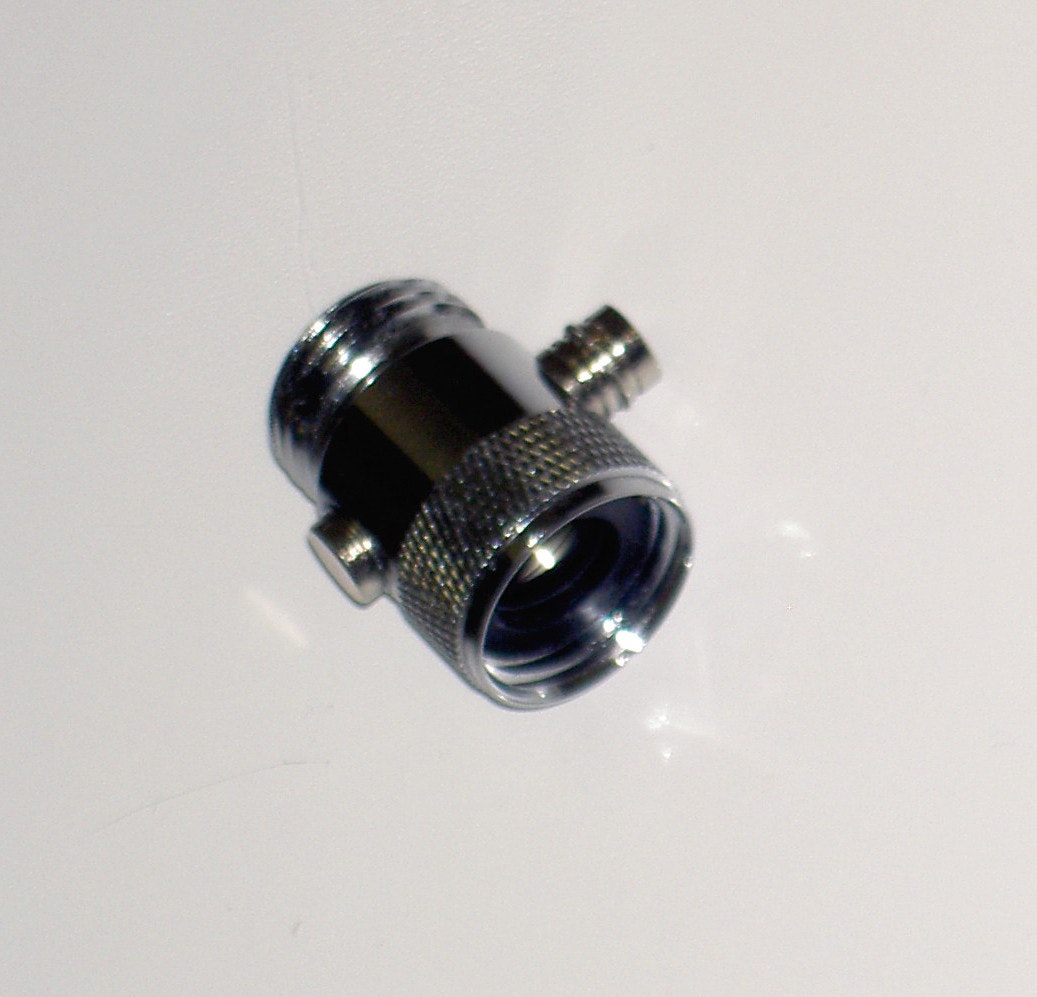 May contain: adapter and electronics