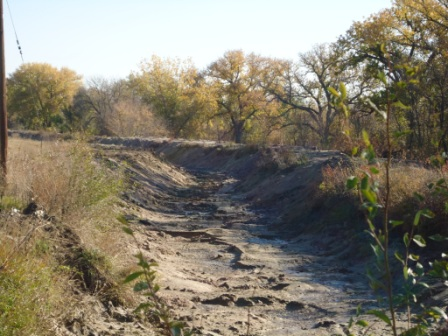 May contain: outdoors, soil, path, creek, nature, stream, water, plant, vegetation, and trail