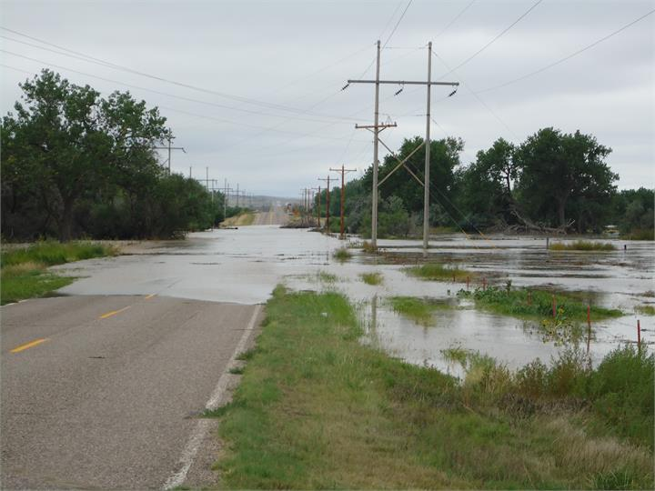 May contain: utility pole, water, and flood