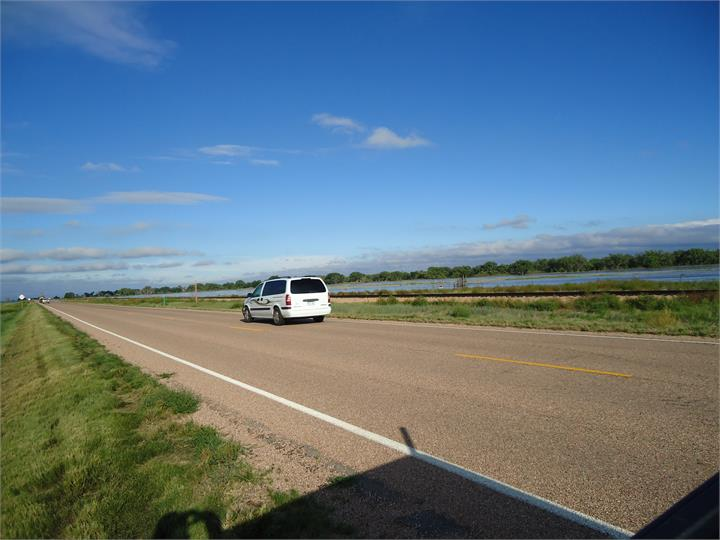 May contain: road, car, transportation, vehicle, freeway, and highway