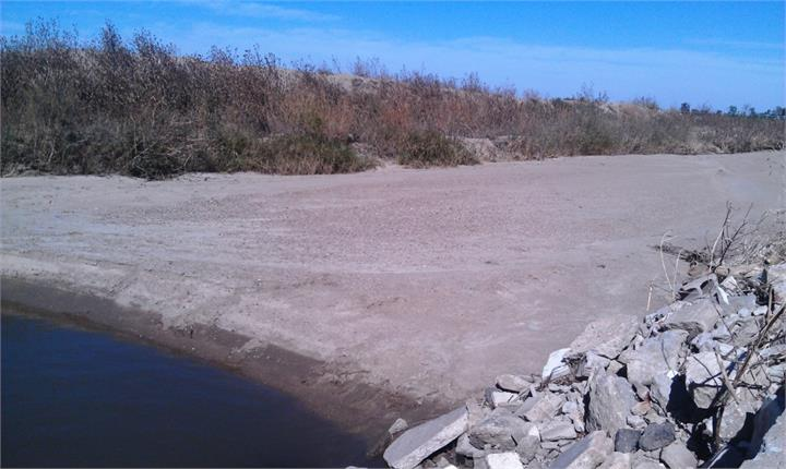 May contain: soil, rock, nature, outdoors, scenery, water, and land