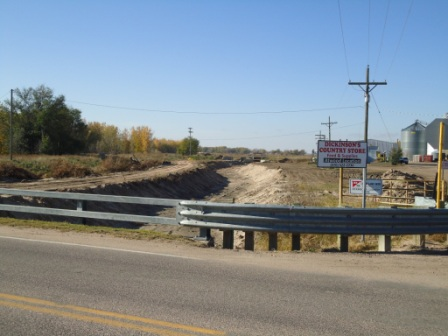 May contain: guard rail and road