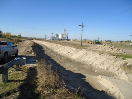 May contain: pickup truck, transportation, truck, vehicle, soil, outdoors, road, ditch, and utility pole