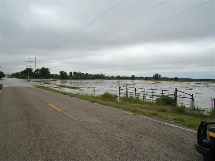 May contain: road, water, car, transportation, and vehicle