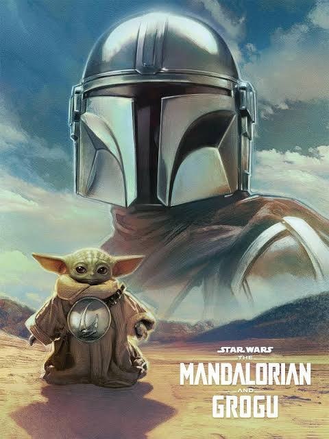 The image features a character from Star Wars, a Mandalorian, and a small figure, Grogu, against a desert backdrop.
