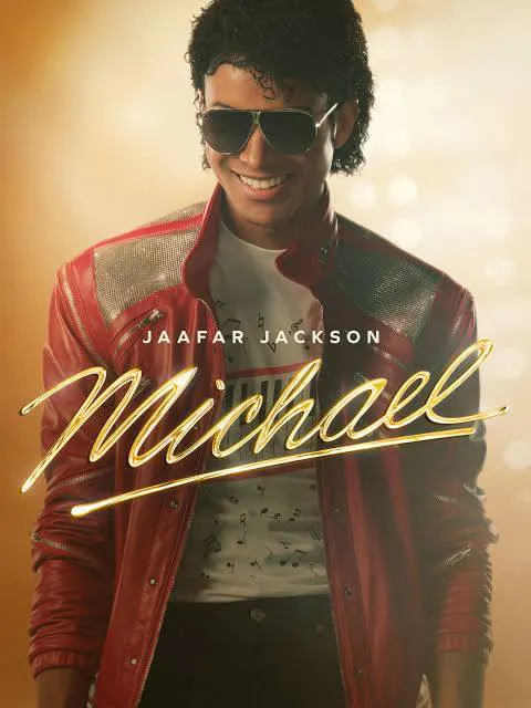 The image features Jaafar Jackson, wearing a red jacket and sunglasses, promoting a project titled "Michael."
