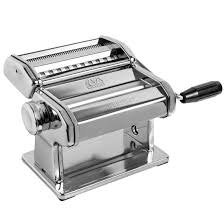 A stainless steel manual pasta maker with a hand crank for rolling and cutting dough.