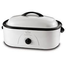 A white electric roasting oven with a black knob and handles.