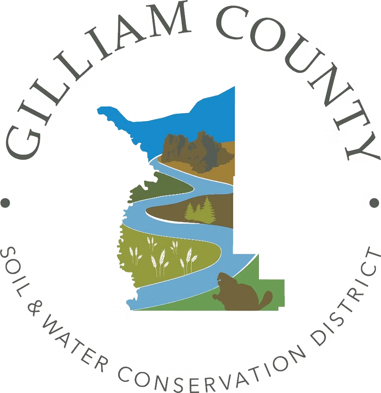 Gilliam County Soil & Water Conservation District logo with landscape and beaver illustration.