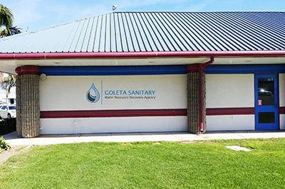 The image shows a building with the sign "Goleta Sanitary Water Resource Recovery Agency" on its exterior wall.
