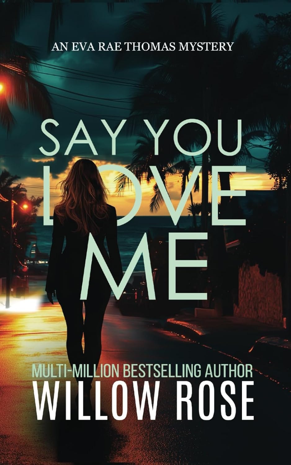 Book cover: "Say You Love Me" by Willow Rose. A silhouette of a woman at sunset, an Eva Rae Thomas mystery.