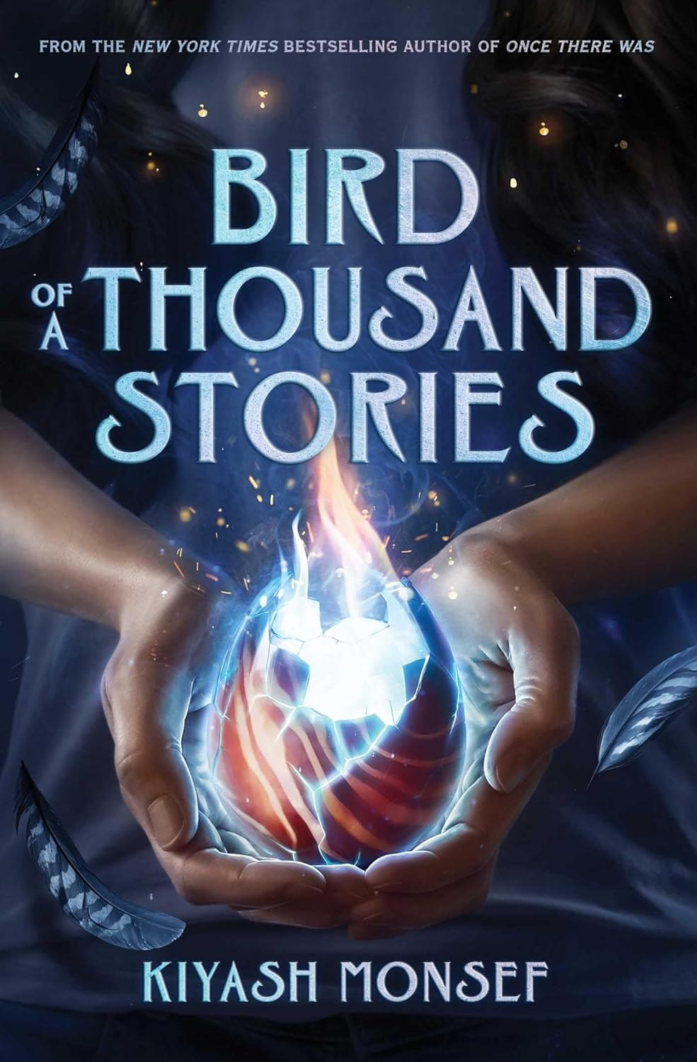 Book cover with hands holding a glowing egg, surrounded by floating feathers. Title: "Bird of a Thousand Stories" by Kiyash Monsef.
